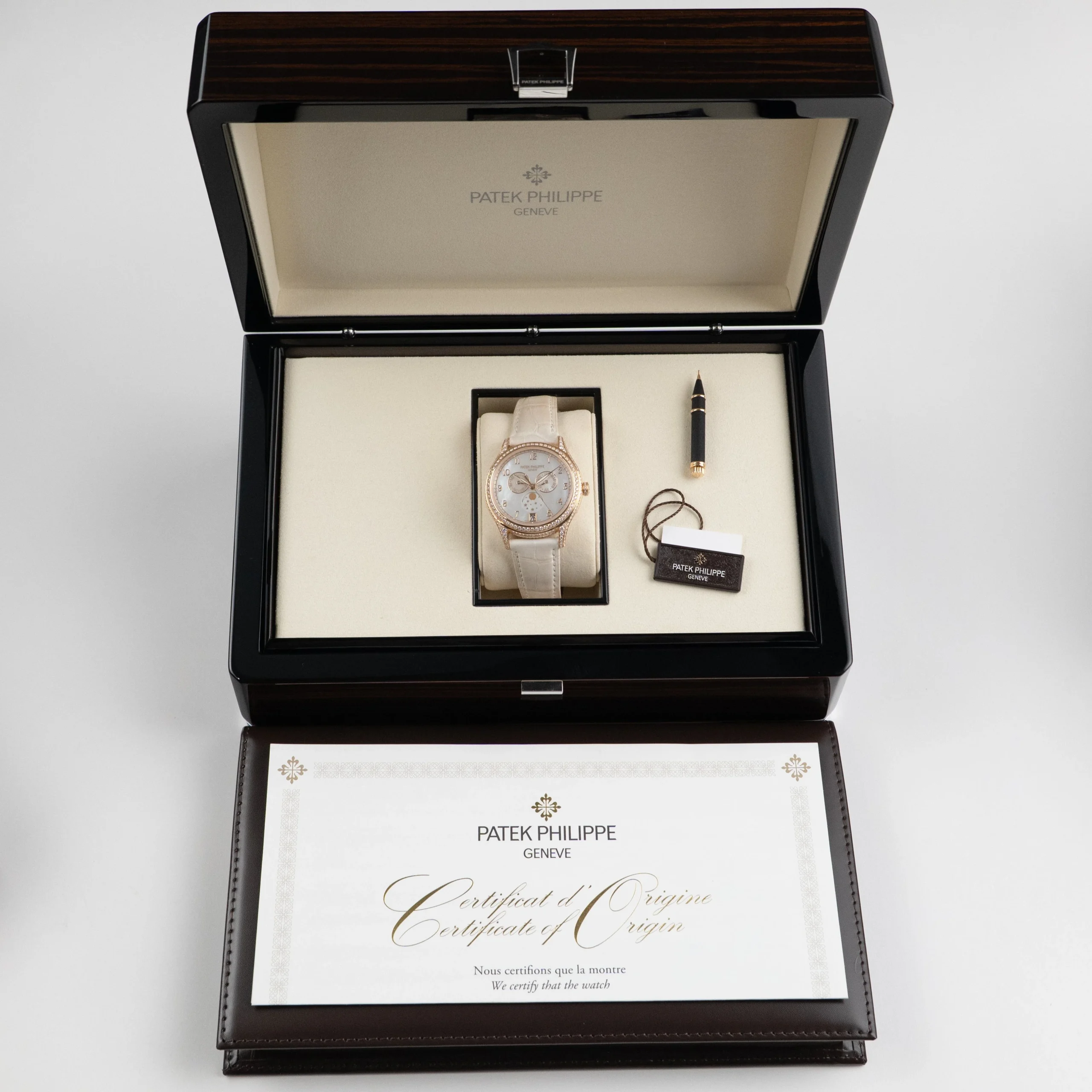 patek-philippe-complications-4948r-001-ladies-annual-calendar-moon-phases-rose-gold-mother-of-pearl-dial-diamond-bezel-2025-patek-philippe-1227902573